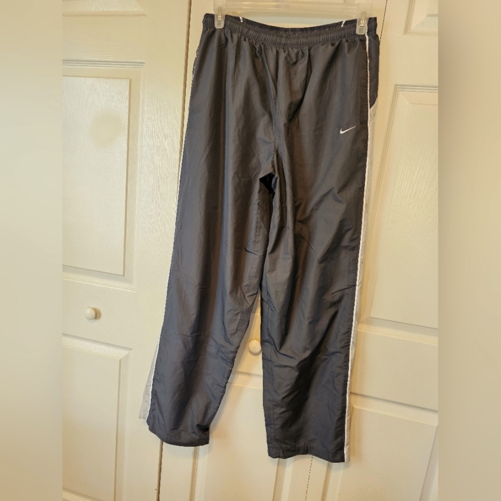 Nike Jogger. Fully lined. Zip leg. Reflective